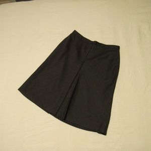 Fully-lined gray skirt with reverse pleat